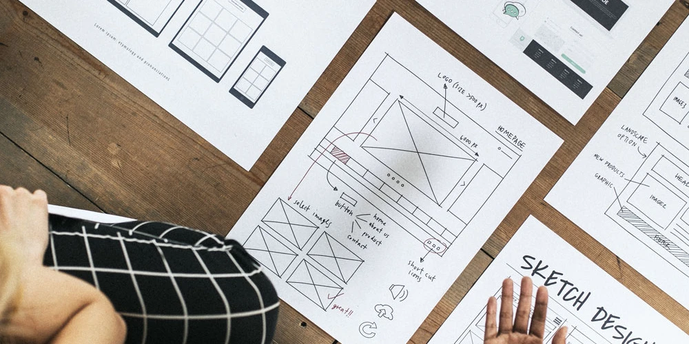 Website modules on sheets of paper